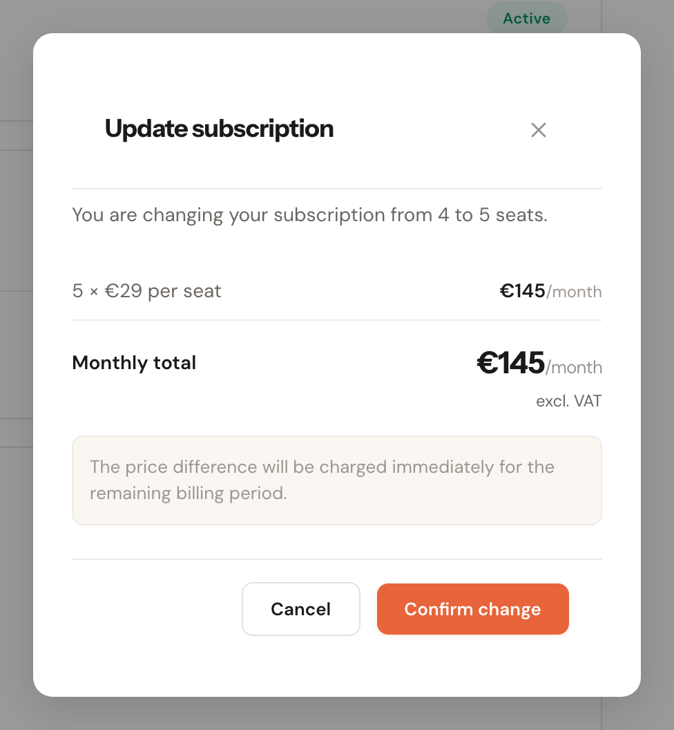 The Change subscription dialog showing the new monthly amount and a note about how the difference is charged.