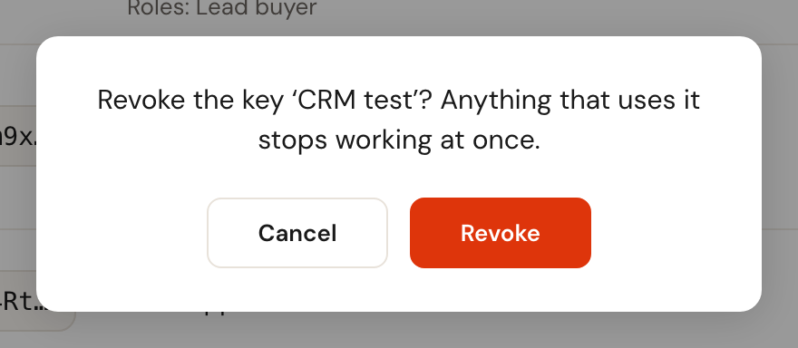 The question whether to revoke the key CRM test, with the Cancel and Revoke buttons.