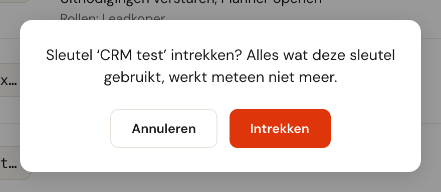 De vraag of je de sleutel CRM test wilt intrekken, met de knoppen Annuleren en Intrekken.