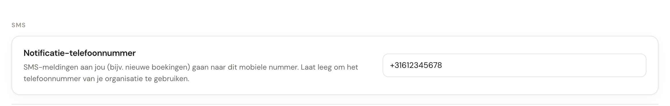 Het tabblad SMS met de kaart Notificatie-telefoonnummer.