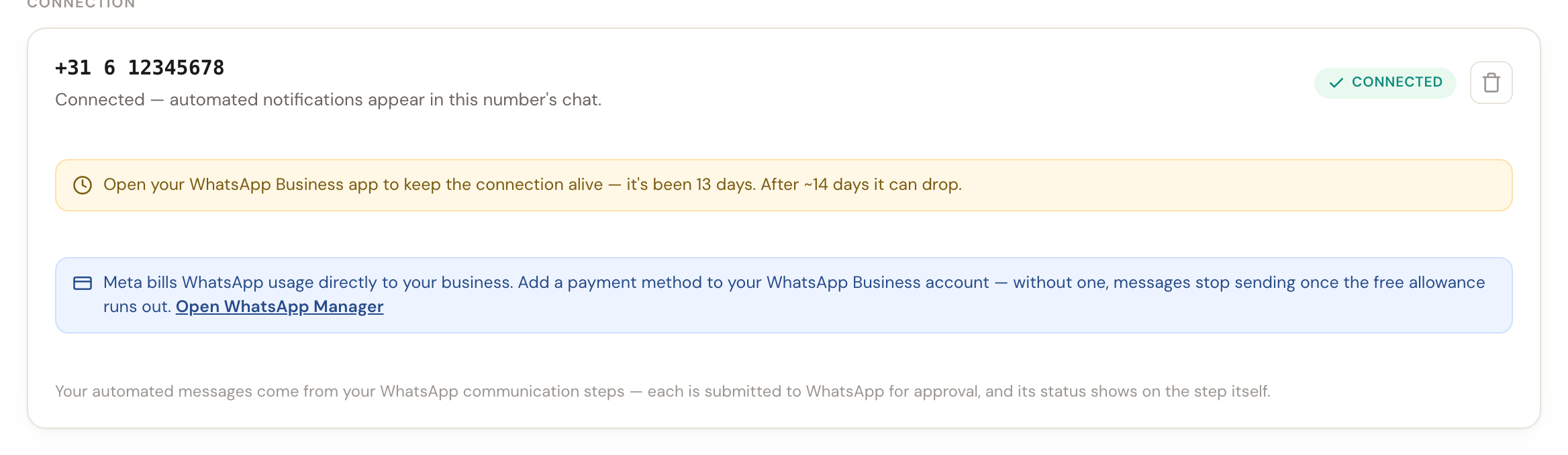 The connected card with a yellow notice to open the WhatsApp Business app.