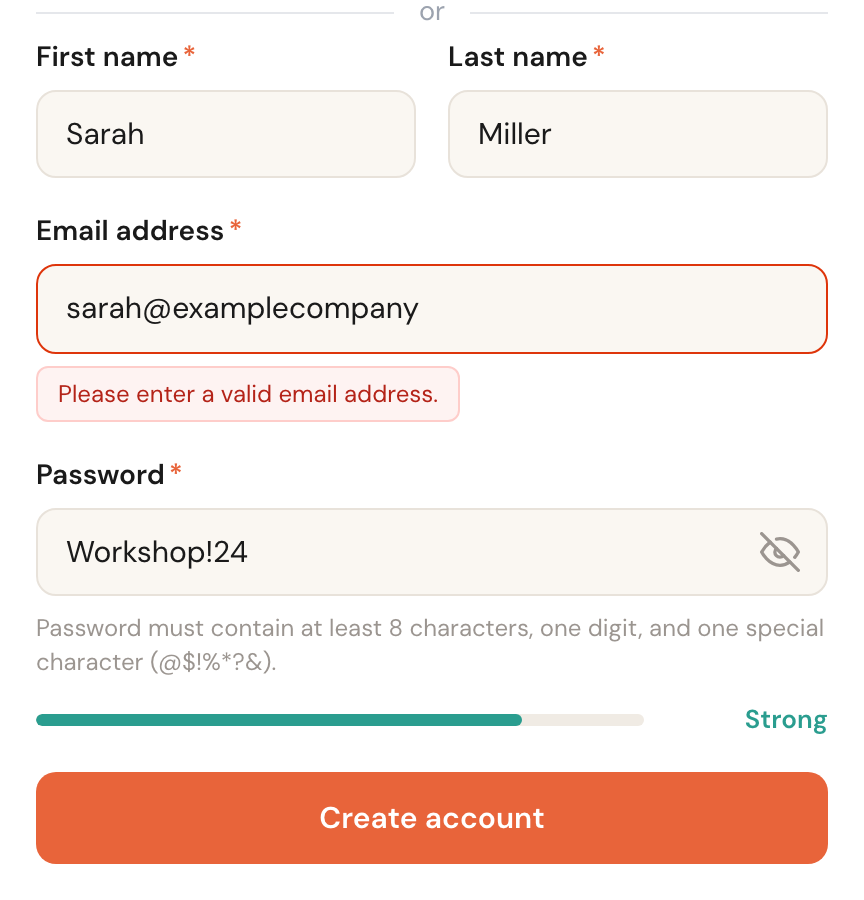 The registration form with a red email field and underneath it the message Please enter a valid email address.