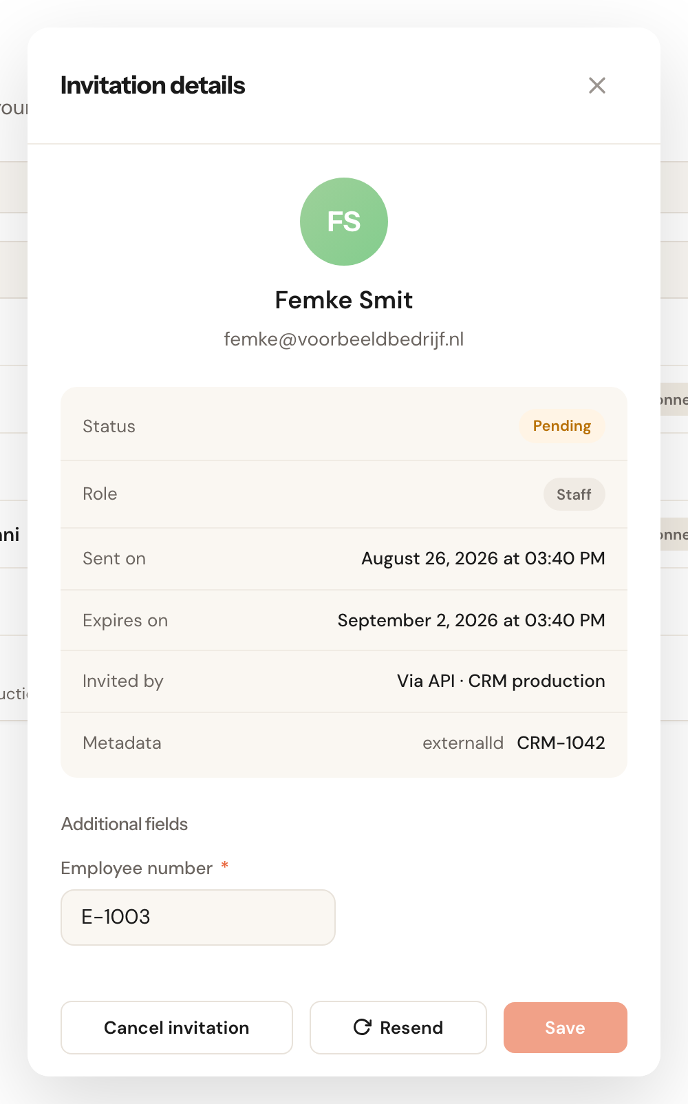 The dialog of a pending invitation your CRM made: Invited by Via API · CRM production, the extra field Employee number and the Metadata externalId.