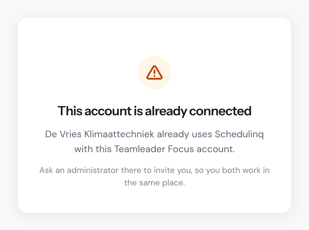 The page This account is already connected, naming the organisation that already uses Schedulinq with this Teamleader Focus account and asking you to have an administrator there invite you.
