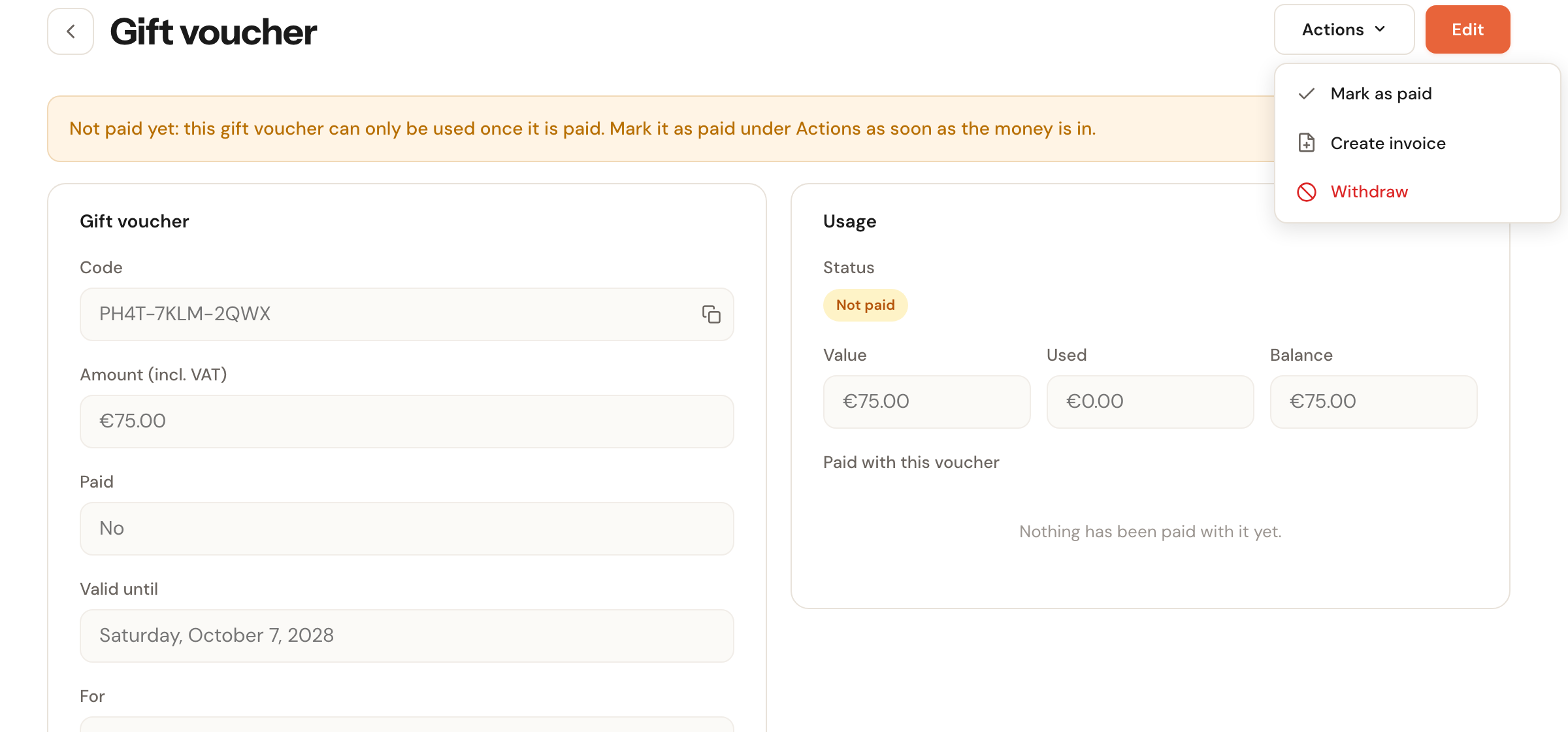The page of a gift voucher that is not paid: the yellow notice Not paid yet, the Paid field set to No, the status Not paid, and the open Actions menu with Mark as paid, Create invoice and Withdraw.