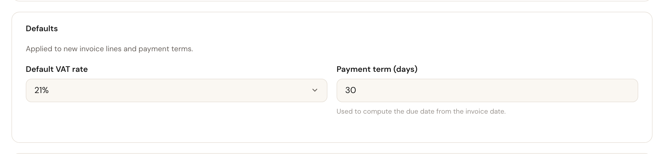 The Defaults block with the default VAT rate and the payment term.