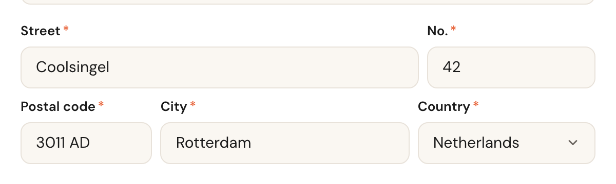 The address fields filled in: street, number, postal code, city and country.