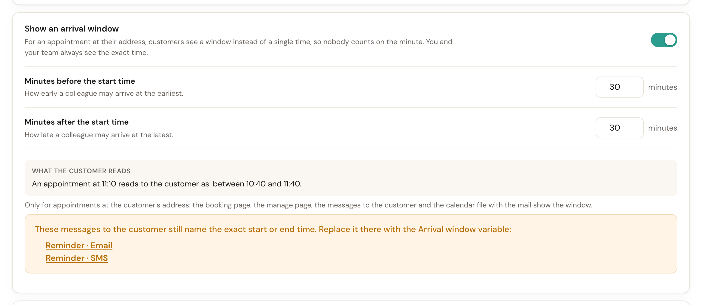 The Show an arrival window card, switched on, with 30 minutes before and 30 minutes after the start time, the example 'An appointment at 11:10 reads to the customer as: between 10:40 and 11:40', the note that this only applies to appointments at the customer's address, and a warning listing Reminder · Email and Reminder · SMS as messages that still name the exact time.