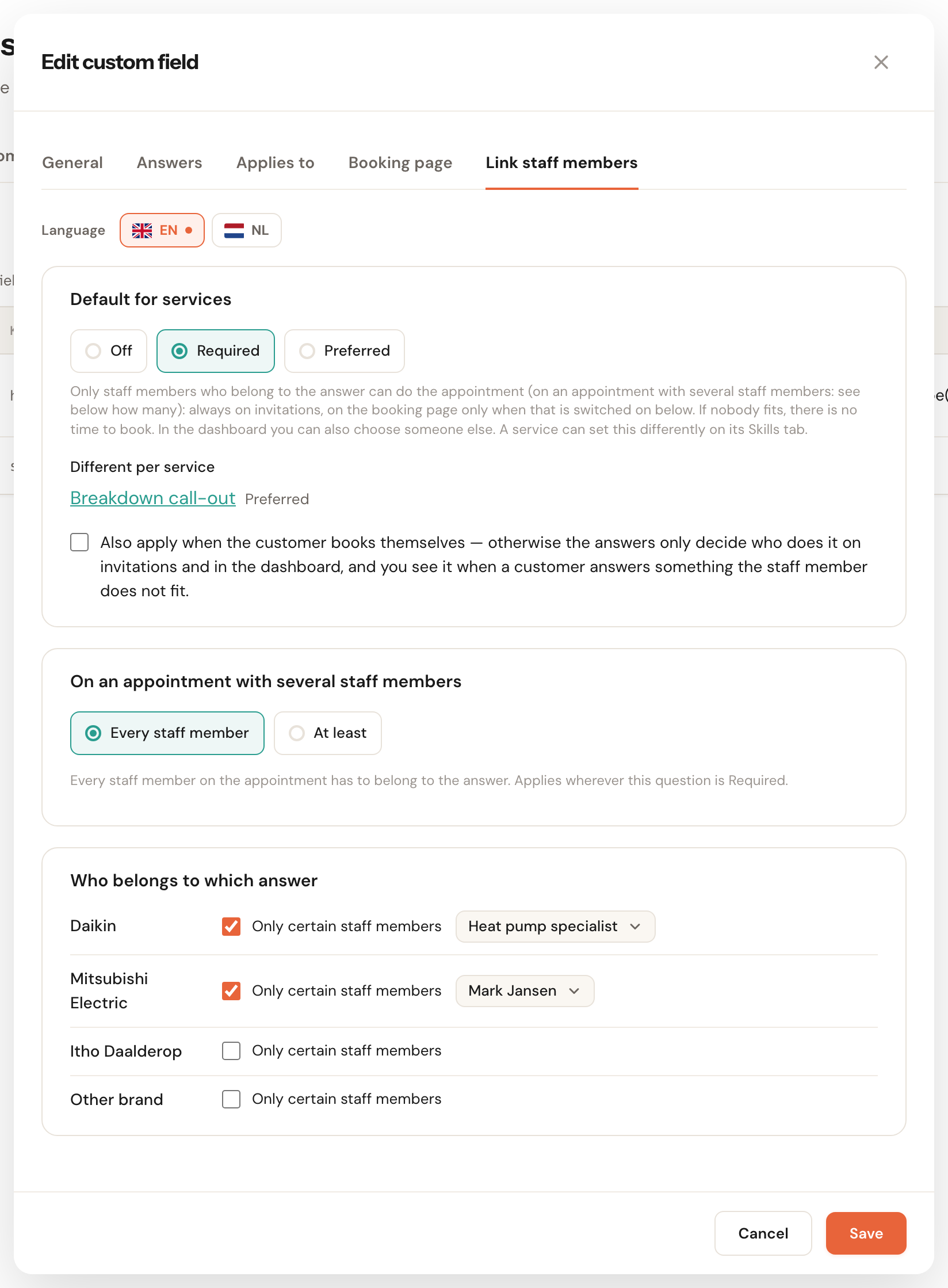 The Link staff members tab of the field Heat pump brand: Default for services set to Required with its explanation, Different per service with Breakdown call-out on Preferred, the still unticked choice Also apply when the customer books themselves, the card On an appointment with several staff members on Every staff member, and the card Who belongs to which answer.