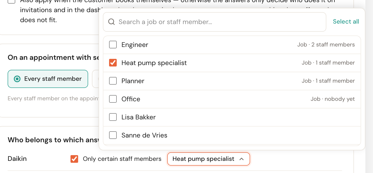 The open picker at Daikin with the jobs Engineer, Heat pump specialist (ticked), Planner and Office at the top, each with its number of staff, and below them the colleagues Lisa Bakker and Sanne de Vries.
