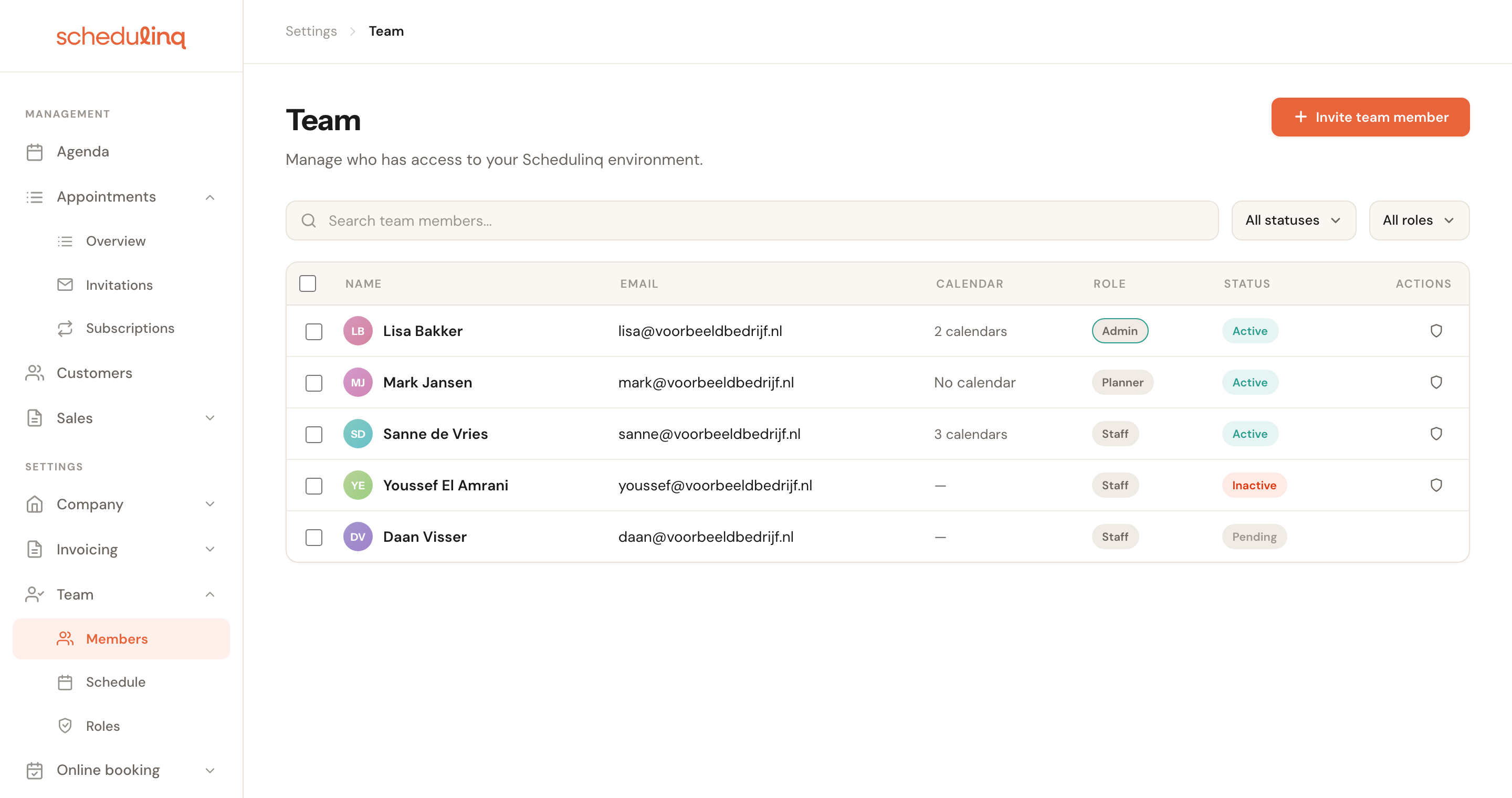 The team list with five rows, each showing name, email, calendar, role and status.